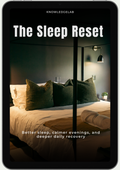 A tablet shows The Sleep Reset ebook cover featuring a cozy bed with green pillows in a softly lit bedroom. Text reads: Better sleep, calmer evenings, and restorative rest through soothing evening routines.
