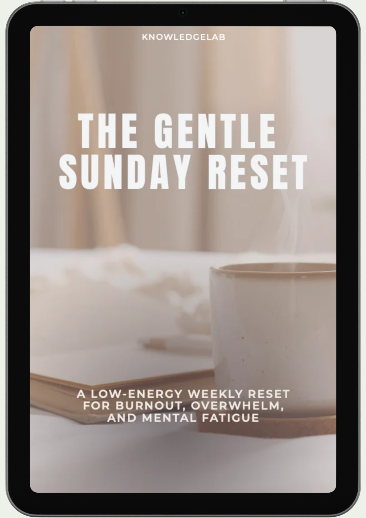 A tablet displays "The Gentle Sunday Reset" from The Everyday Wellness Collection, featuring a steaming mug and soft bedding—perfect for a low-energy weekly reset to support sustainable well-being and recovery.
